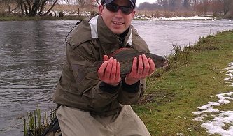 Photograph of James Hunt with a magnificent 43cm grayling