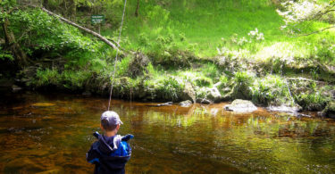 My son Zachary fishing Hebden Water in Hardcastle Crags